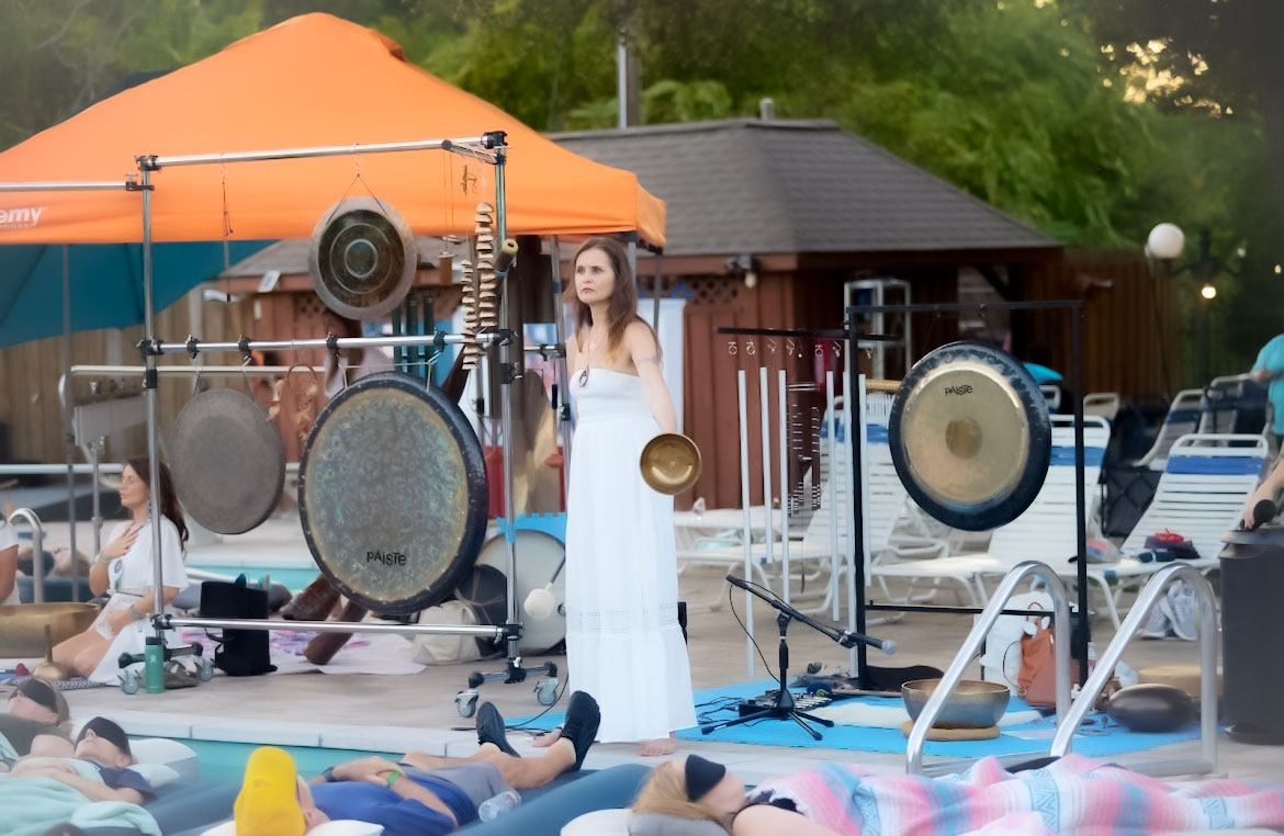 Diana Perov Sound Healer performing a floating sound bath in Dallas Texas